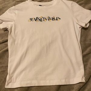 Short sleeve shirt a little cropped not to much.